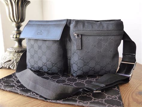 black gucci bag with silver hardware